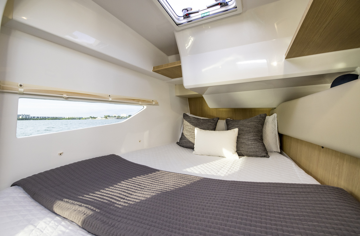 Double cabin inside the catamaran while sailing in the Sardinian sea