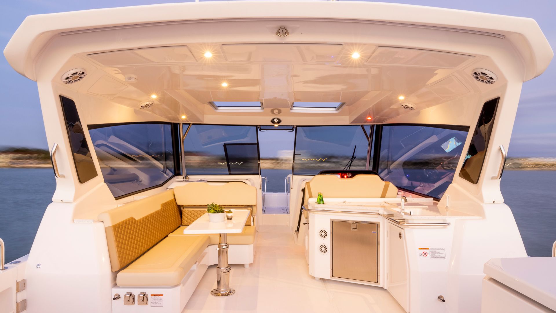 Interior lounge of the catamaran during the excursion to Cala Luna