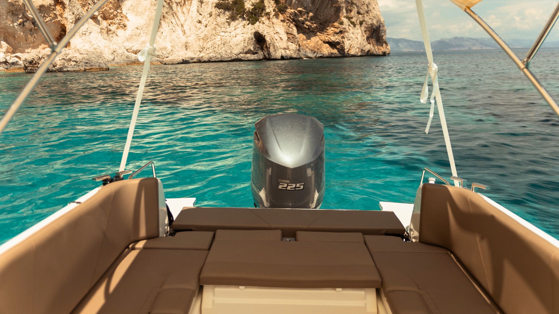 Stern of the dinghy during the excursion to Cala Biriala